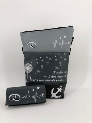 Family with dandelion, anchor &amp; wedding rings